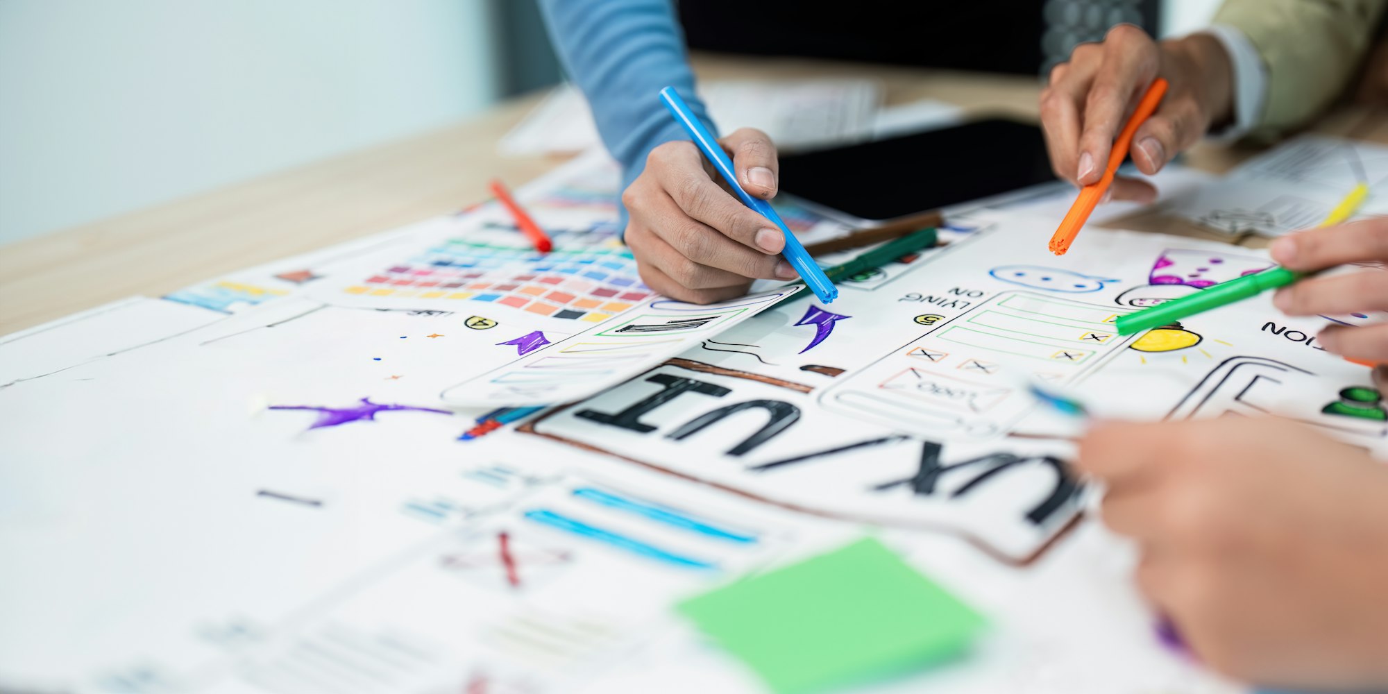 Web design team planning a responsive website for a business in Malta